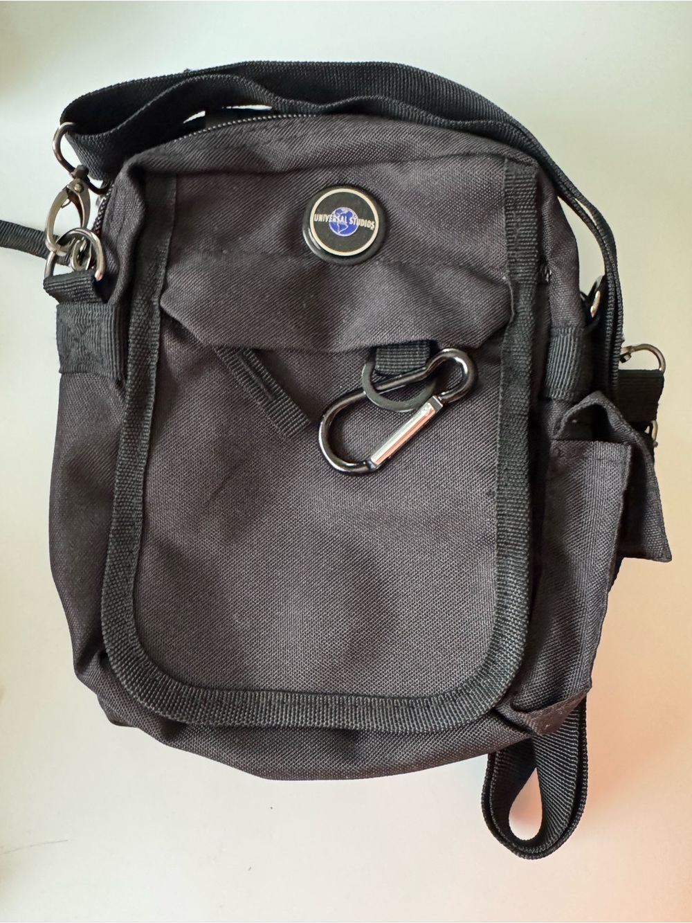 Universal Studios Black Compact Messenger Bag with Carabiner Accent